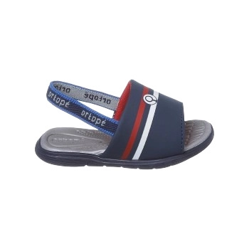 Na imagem temos uma linda sandália infantil masculina Ortopé nas cores azul marinho, branco e vermelho. Elástico aplicado no calcanhar para evitar que o pezinho saia do calçado durante o uso..